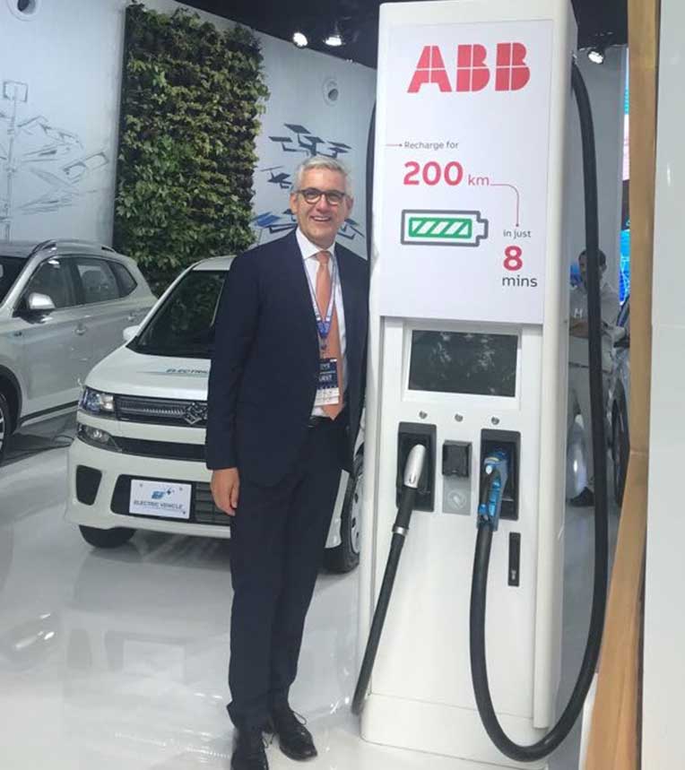 Ulrich Spiesshofer, Chief Executive Officer of ABB with ABB fast-charger at the MOVE Global Mobility Summit 2018