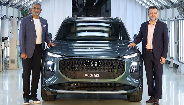 L to R - Piyush Arora, MD & CEO, SAVWIPL and Balbir Singh Dhillon, Brand Director, Audi India with the all-new Audi Q3