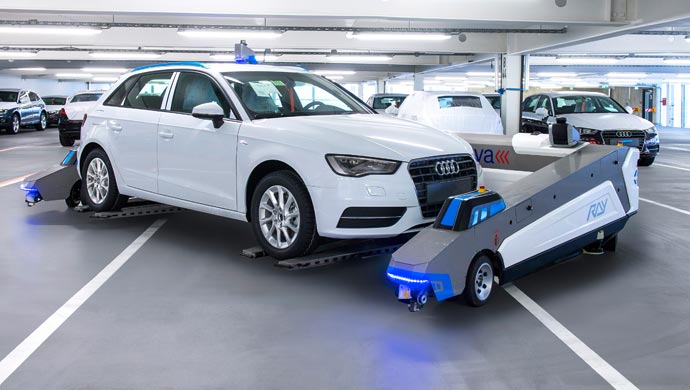 Robot transporting Audi vehicle