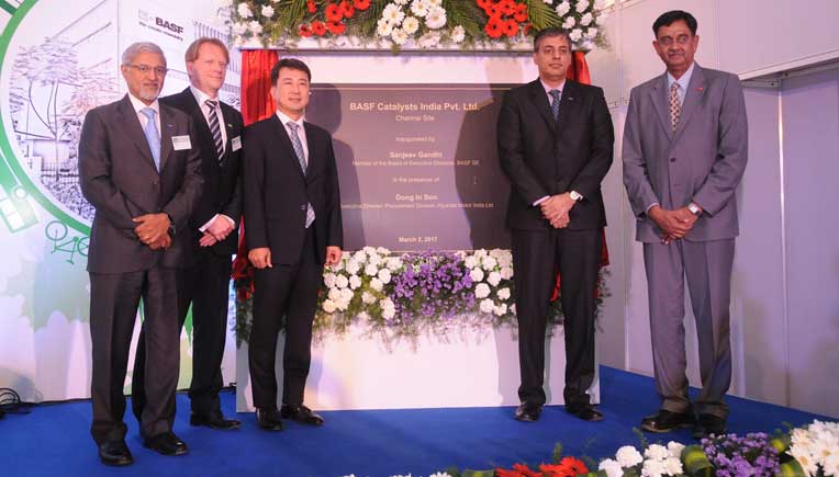 Senior company officials at the inauguration of the new site