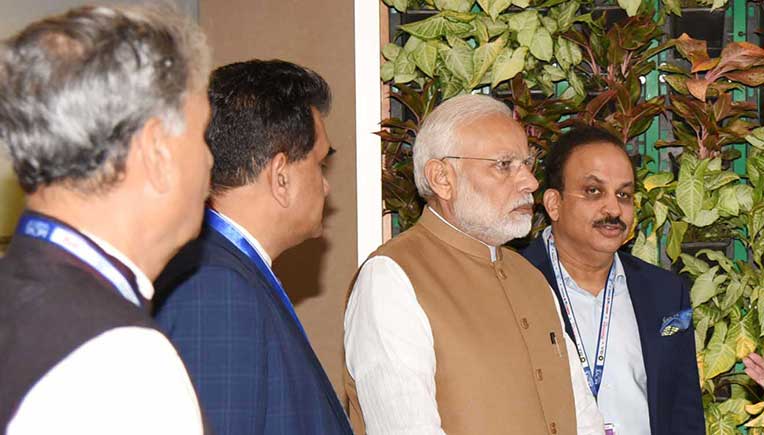 Prime Minister Narendra Modi at the Hero Cycles corner at Global Mobility Summit 2018: PIB
