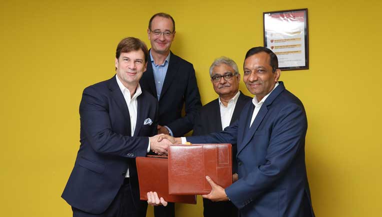 Mahindra, Ford sign MoUs to co-develop midsize SUV, EV & connected car solutions