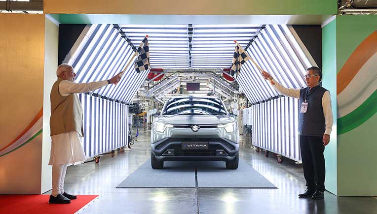 PM commemorates e-Vitara prodn, exports from Maruti Suzuki Gujarat plant 