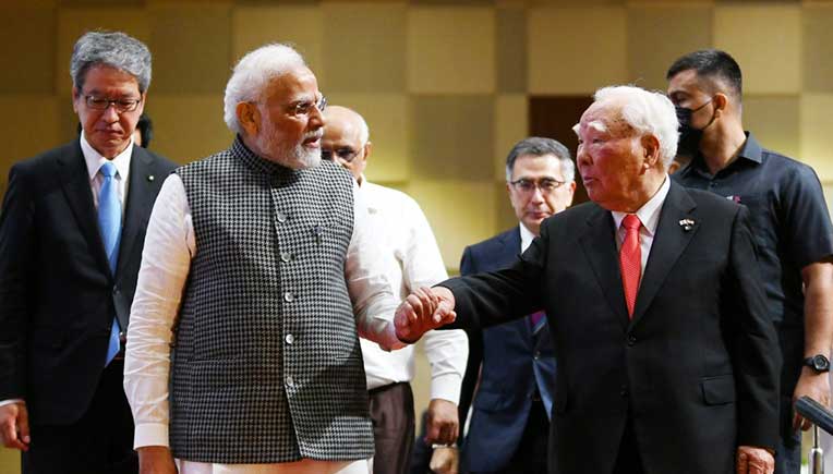 PM lays foundation stone for Suzuki electric vehicle battery plant