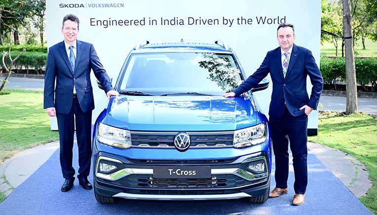 Christian Cahn von Seelen, Chairman, SAVWIPL (Left in Blue Tie) and Mojmir Hajek, Executive Director, Technical, SAVWIPL with Volkswagen T-Cross.
