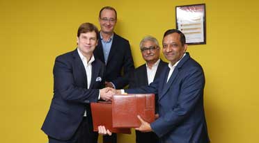 Mahindra, Ford sign MoUs to co-develop midsize SUV, EV & connected car solutions