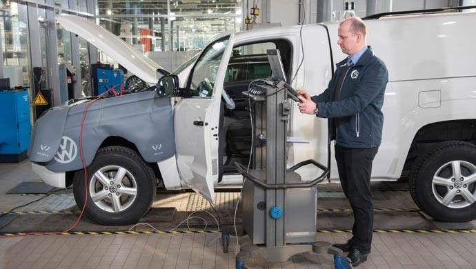 Inspecting a vehicle at the VW plant; Pic for representation purpose only