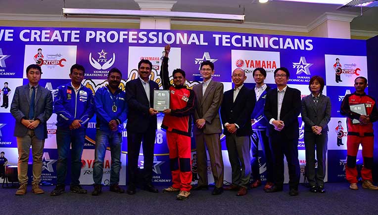 Mohd Abid being felicitated