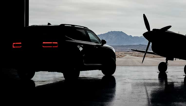JSW MG Motor India teased its first product built on the ADAPT platform. Drawing inspiration from one of the most iconic Allied fighter aircraft of World War II, the upcoming vehicle will be offered a