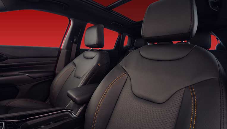 Black leatherette seats with mayan gold stitching