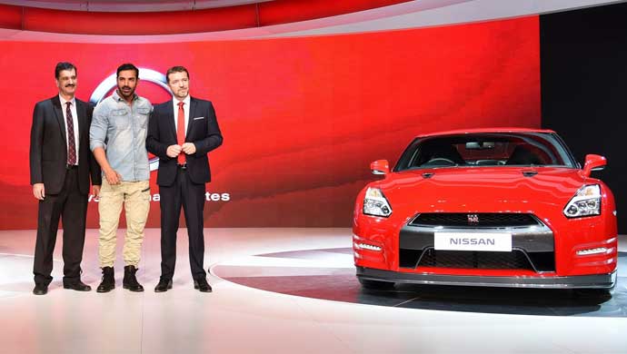 (L -R) Mr. Arun Malhotra, MD Nissan Motor India Pvt Ltd, John Abrahm and Mr. Guillaume Sicard, President, Nissan Motor India Operations.