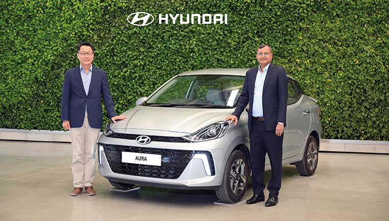 Unsoo Kim – MD & CEO,  and Tarun Garg – COO (Sales, Marketing, Service & Product Strategy, HMIL