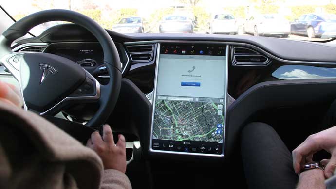 Once you sit on the driver’s seat you cannot miss seeing the large 17 inch touchscreen which controls most of the car's functions.