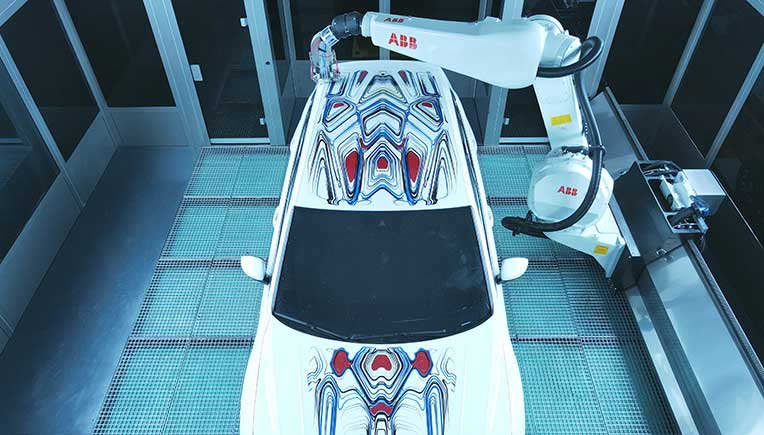 ABB Robotics unveils world’s first robot-painted art car