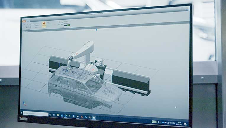 ABB Robotics unveils world’s first robot-painted art car