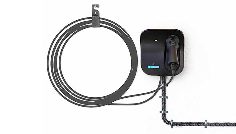 Uno Minda launches portable EV wall charger at Rs 32,514