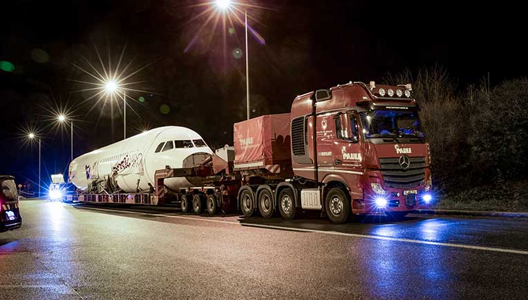 A flight by road on a Mercedes-Benz truck