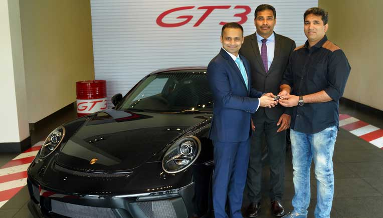 Pavan Shetty, Director of Porsche India, and Sabu Johny, Managing Director, Porsche Centre Kochi handed over the keys of the all-new Porsche 911 GT3 to to Ashique Thahir.