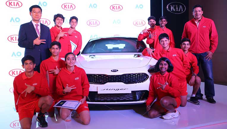 Kookhyun Shim, Managing Director & CEO of Kia Motors India, India's legendary tennis player Mahesh Bhupathi and the ballkids squad from India