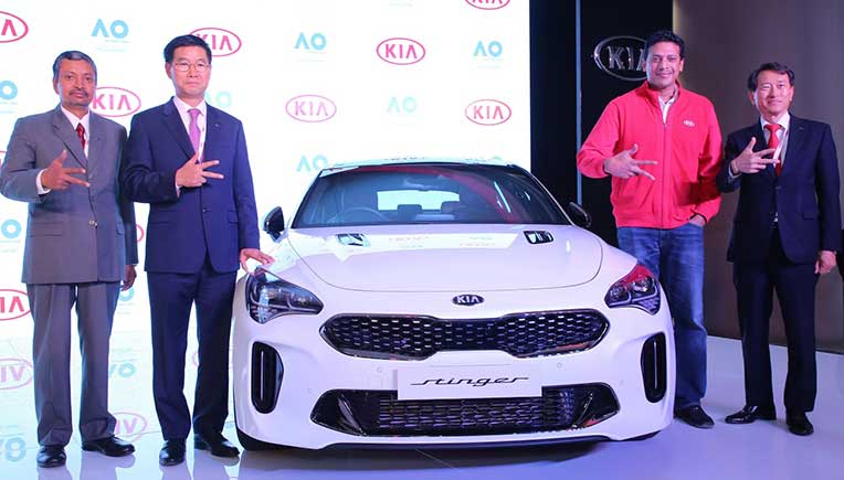 Senior Kia officials with the ballkid squad from India