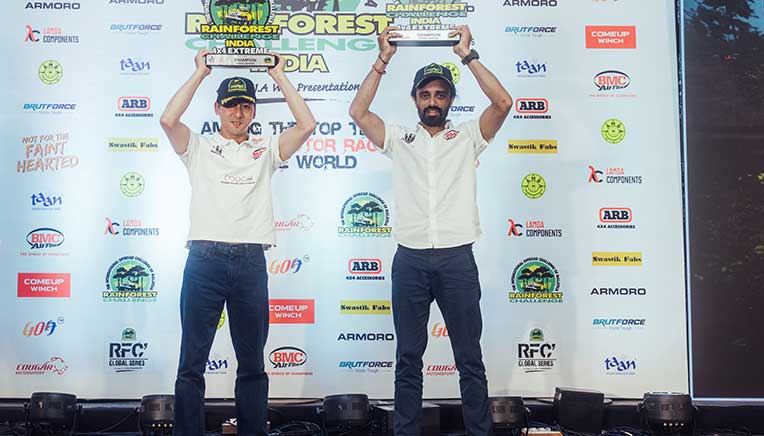 Ujjal-Namshum-(second-from-right)-and-co-driver-Chethan-Chengappa-(extreme-right)-receiving-their-Overall-Champions-trophies-for-the-4x4-Extreme-category