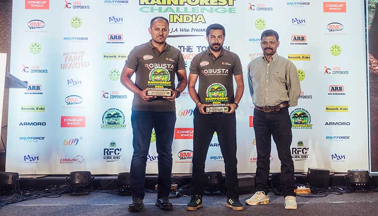 Gagan-Karumbaiah-(2nd-from-left)-and-co-driver-Bopanna-Maleyanda-(2nd-from-right)-with-their-trophies-as-the-second-runners-up-under-the-4x4-Modified-category IMAGE COURTESY COUGAR MOTORSPORT