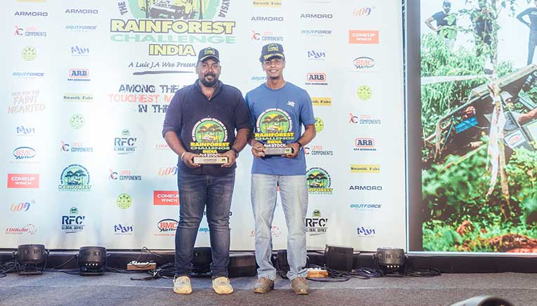 Athul-Thomas-(second-from-right)-and-co-driver-Binil-Babu-(extreme-right)-receiving-their-Overall-Champions-trophies-for-the-4x4-Stock-category IMAGE COURTESY COUGAR MOTORSPORT
