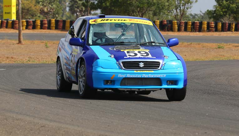 Ashish Ramaswamy winning the JK Touring Cars race