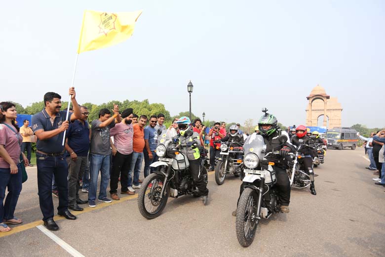 Shaji Koshy, Senior Vice President, Sales, Services and Spares, Royal Enfield flagging off rally