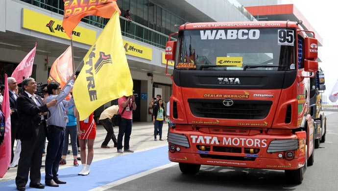 Arun Bajoria flagging off a truck at the BIC