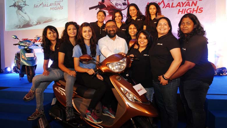 Lady riders with senior TVS official