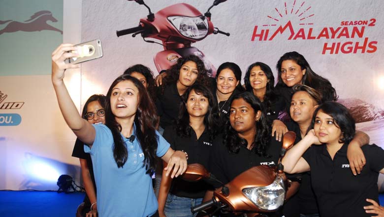 TVS riders posing for a picture