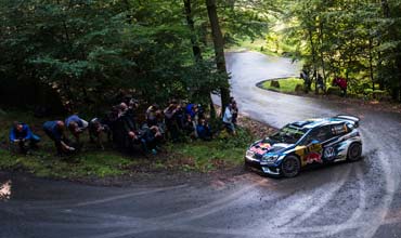 Volkswagen's Sebastien Ogier wins WRC; ends six-event winless drought.