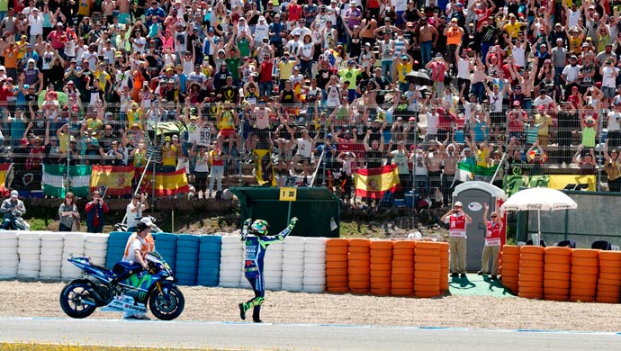 Valentino Rossi acknowledging the crowds after his win